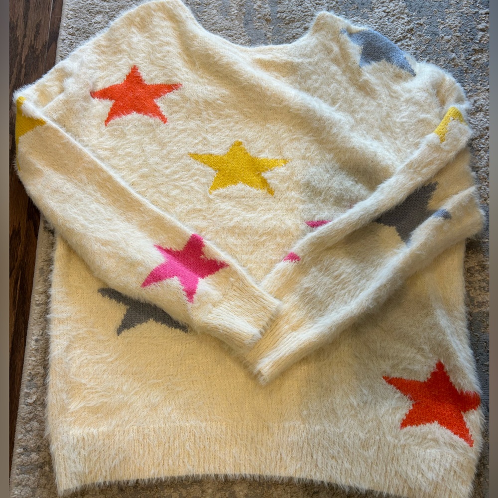 Boutique fuzzy star sweater.